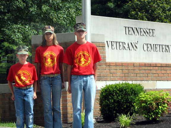 Members of The Young Marines in Knoxville, TN stand proudly in front of the Entrance to the Tennessee Veterans Cemetery